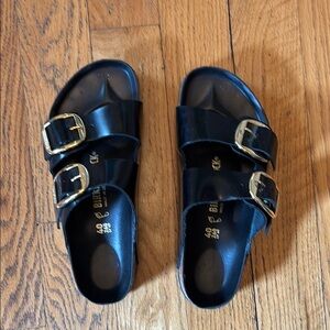 Black Birkenstock Sandals with Gold Buckles